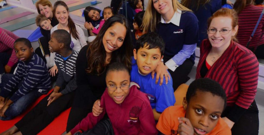 Pop.Earth staff and participants smiling together at a community event